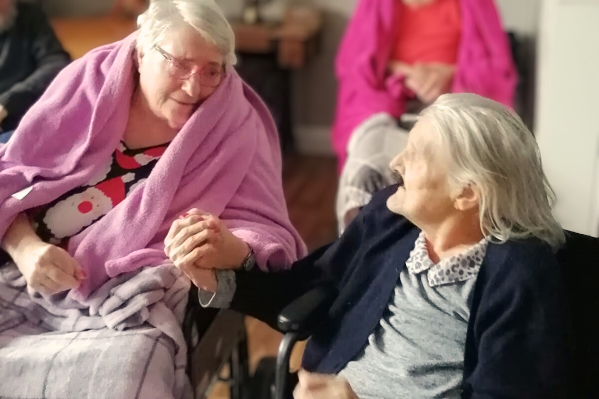 two older ladies talking to each other